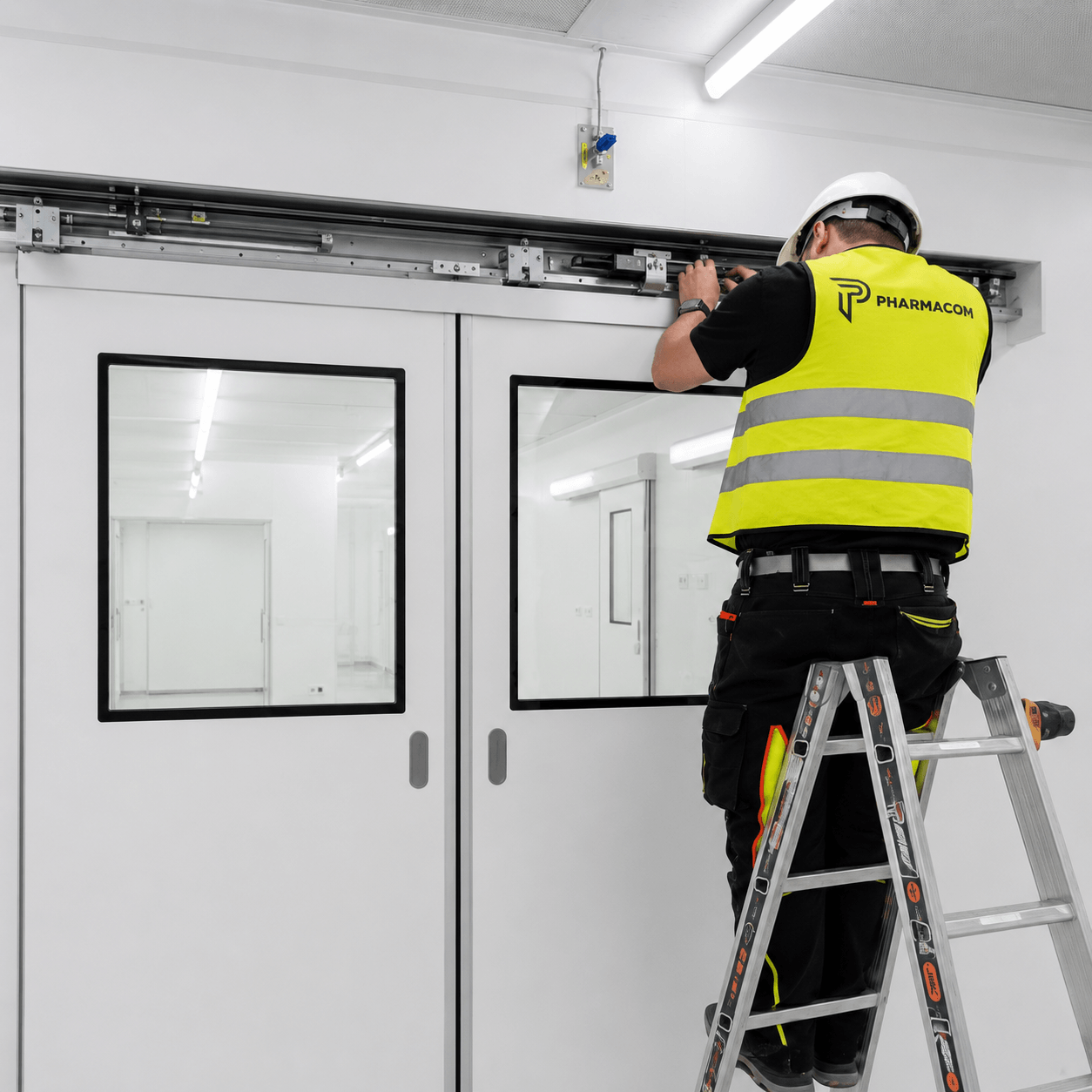 pharmacom-cleanroom-door-repair-service